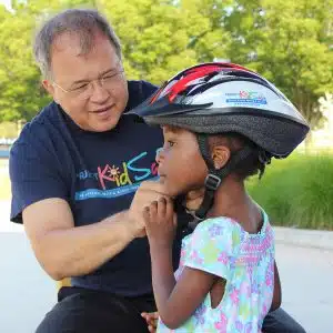 Bicycle helmet donations for children at the Tierney Center in South Boston