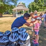 Breakstone, White & Gluck's Project KidSafe bike helmet donation at the Dedham Bike Rodeo, July 27, 2022.